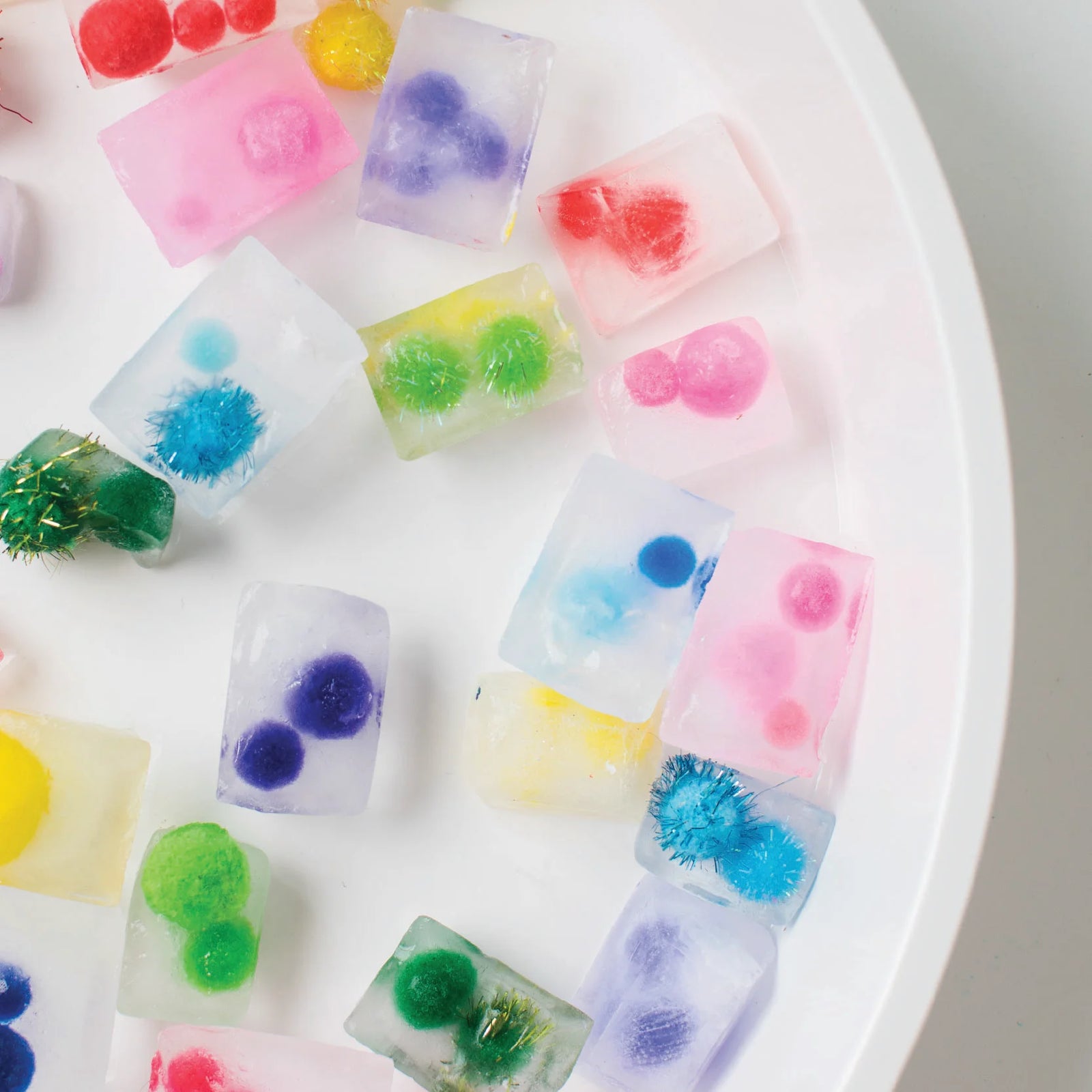 Keeping Cool with pom pom ice cubes in PlayTRAY
