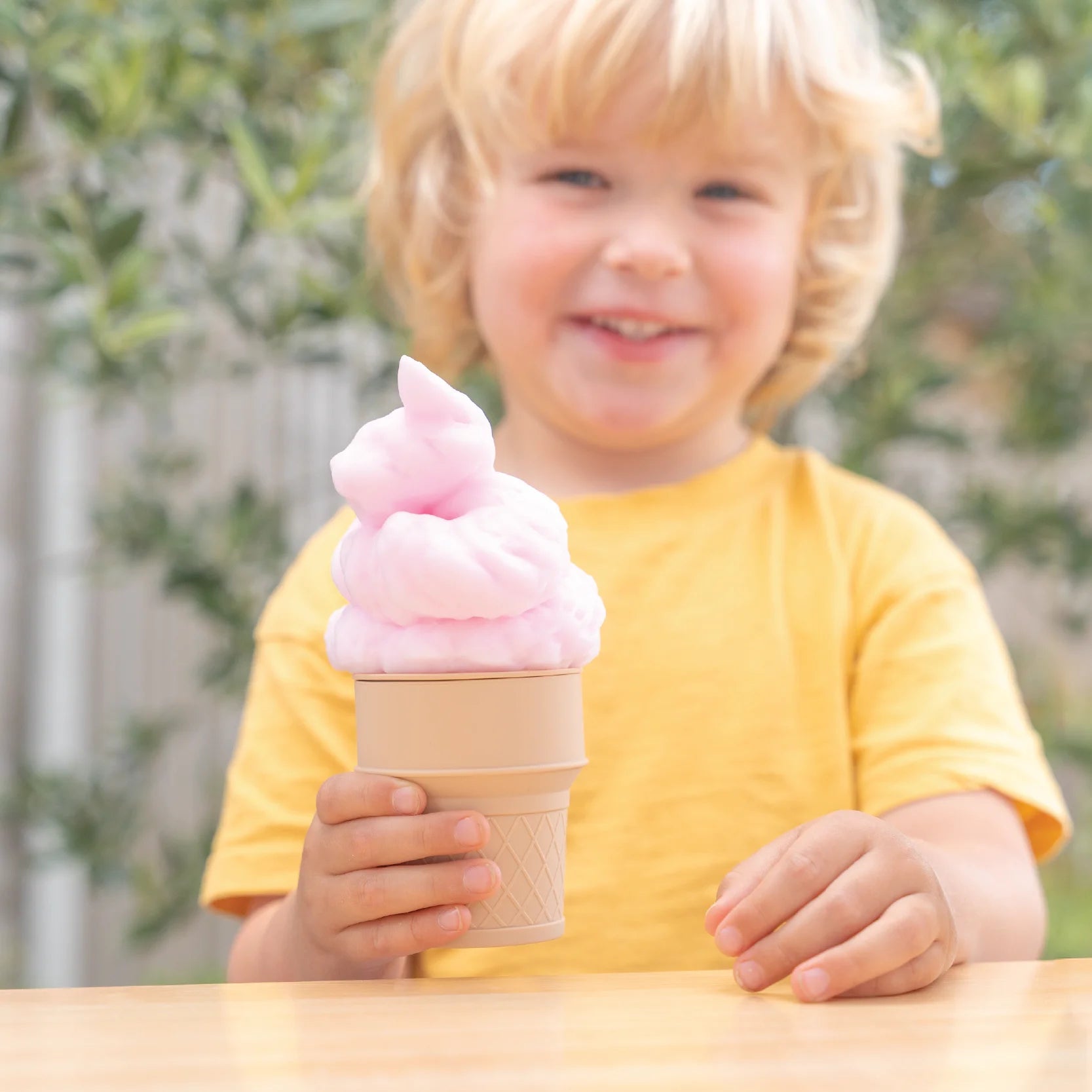 Child holding ice cream