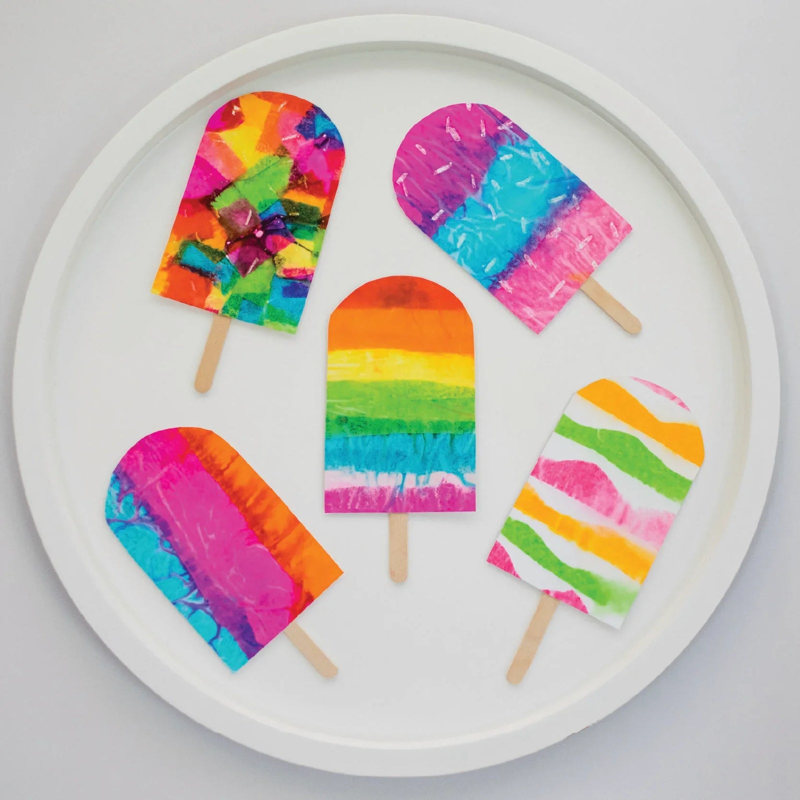 tissue paper ice lollies on PlayTRAY lid