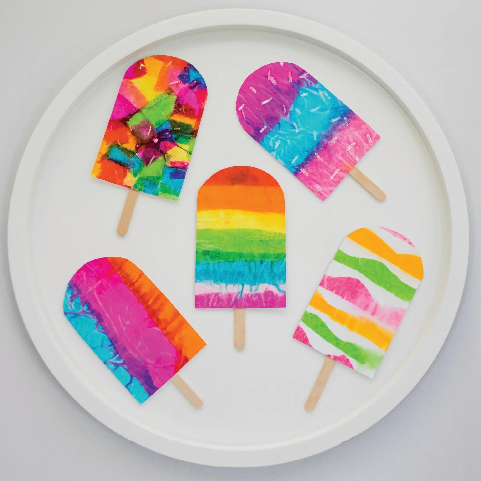 tissue paper ice lollies on PlayTRAY lid