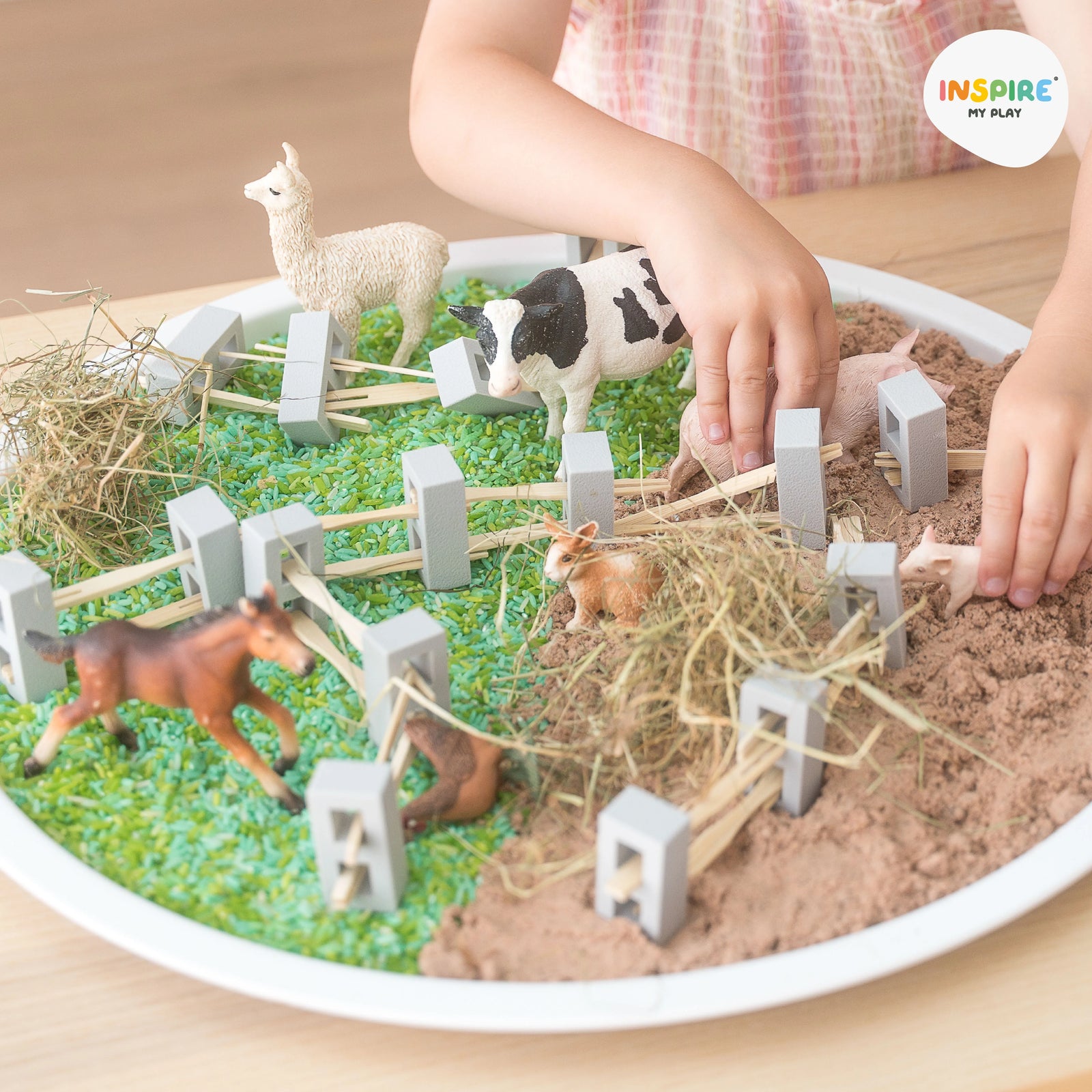 Child Playing in playTRAY with sensory farm