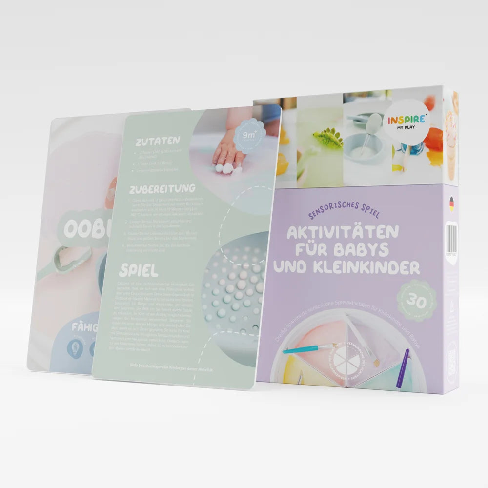 A box set of baby and toddler activity cards with two cards on display.