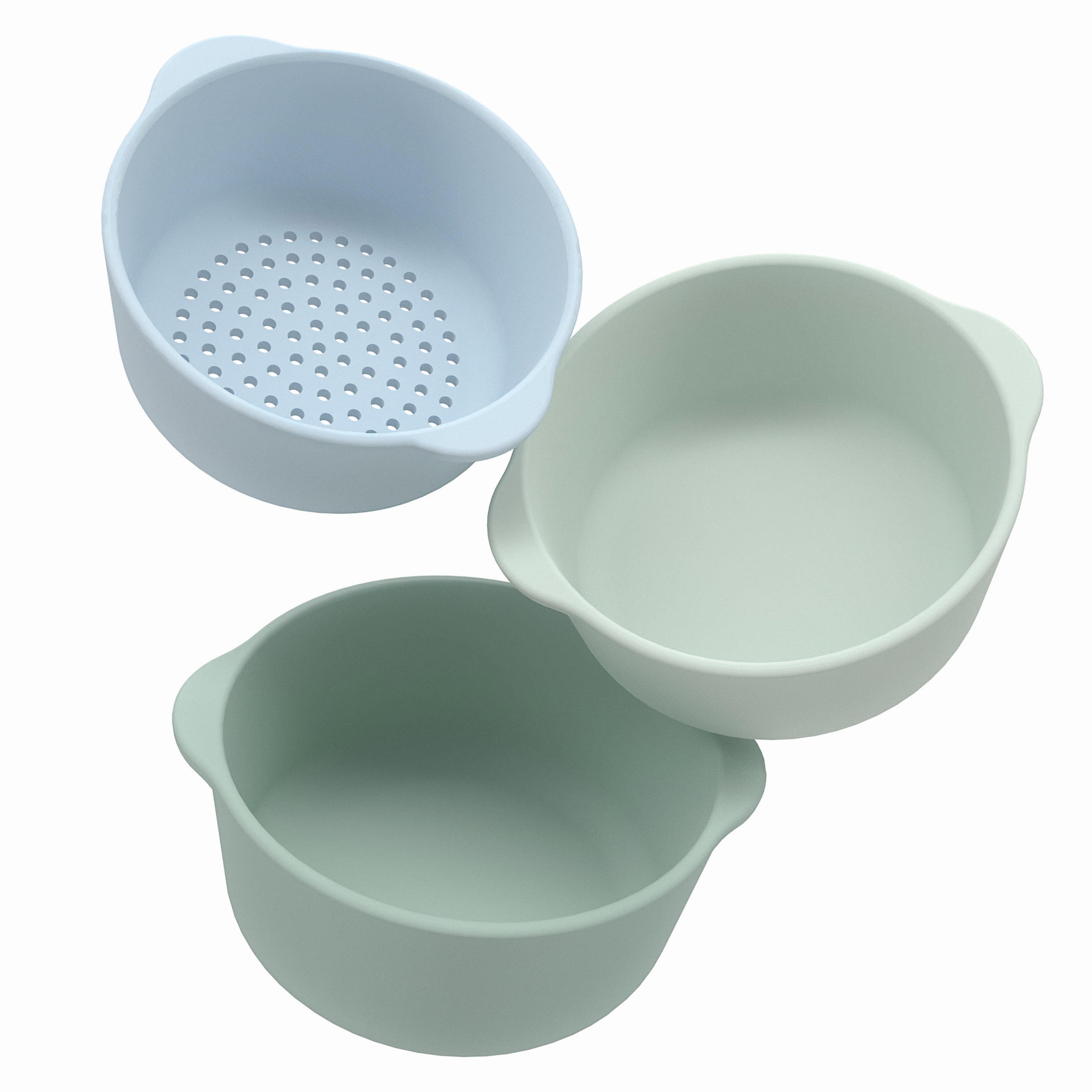 Set of three silicone sensory play nesting bowls in light blue and green on a white background