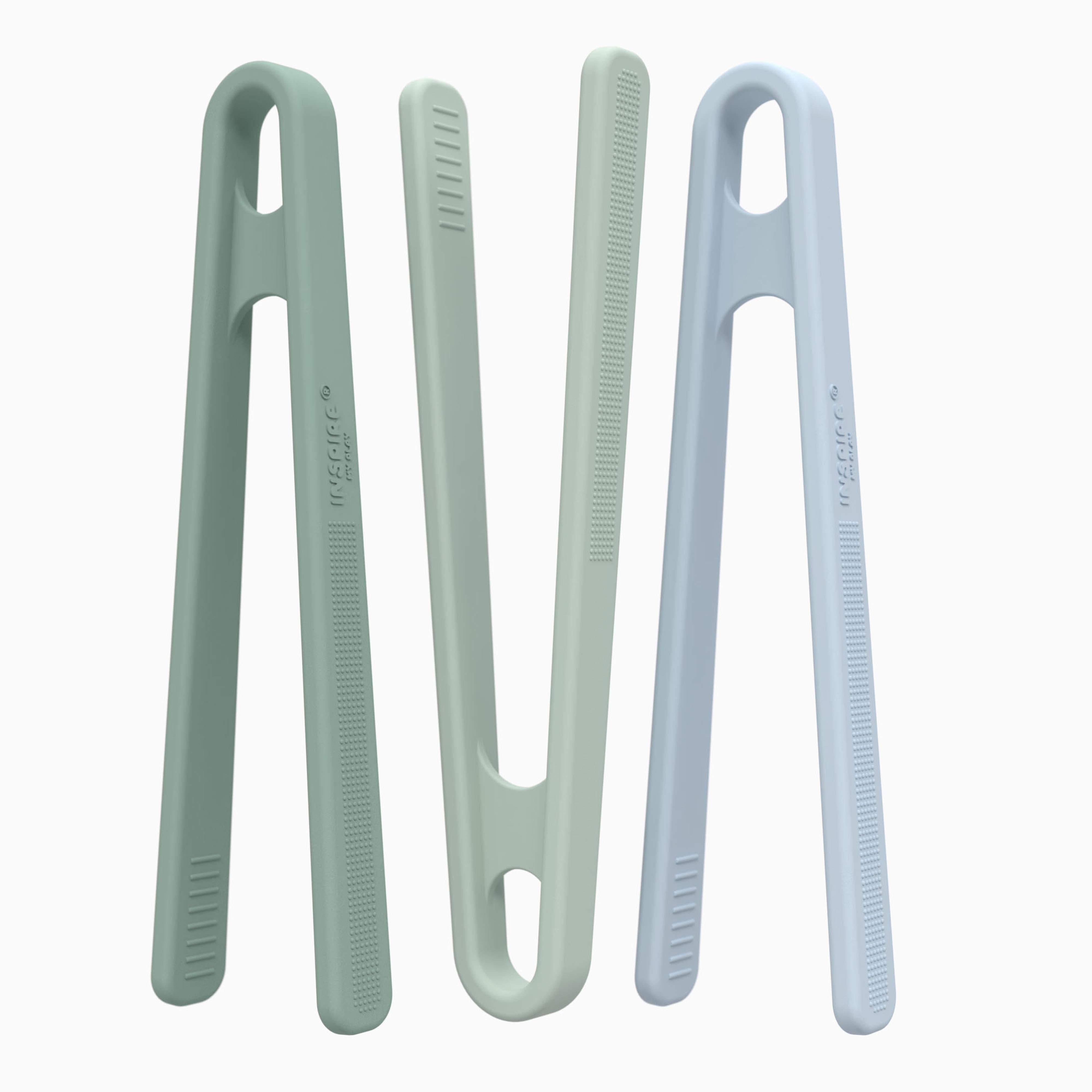 Set of three green and blue sensory play tongs on a white background