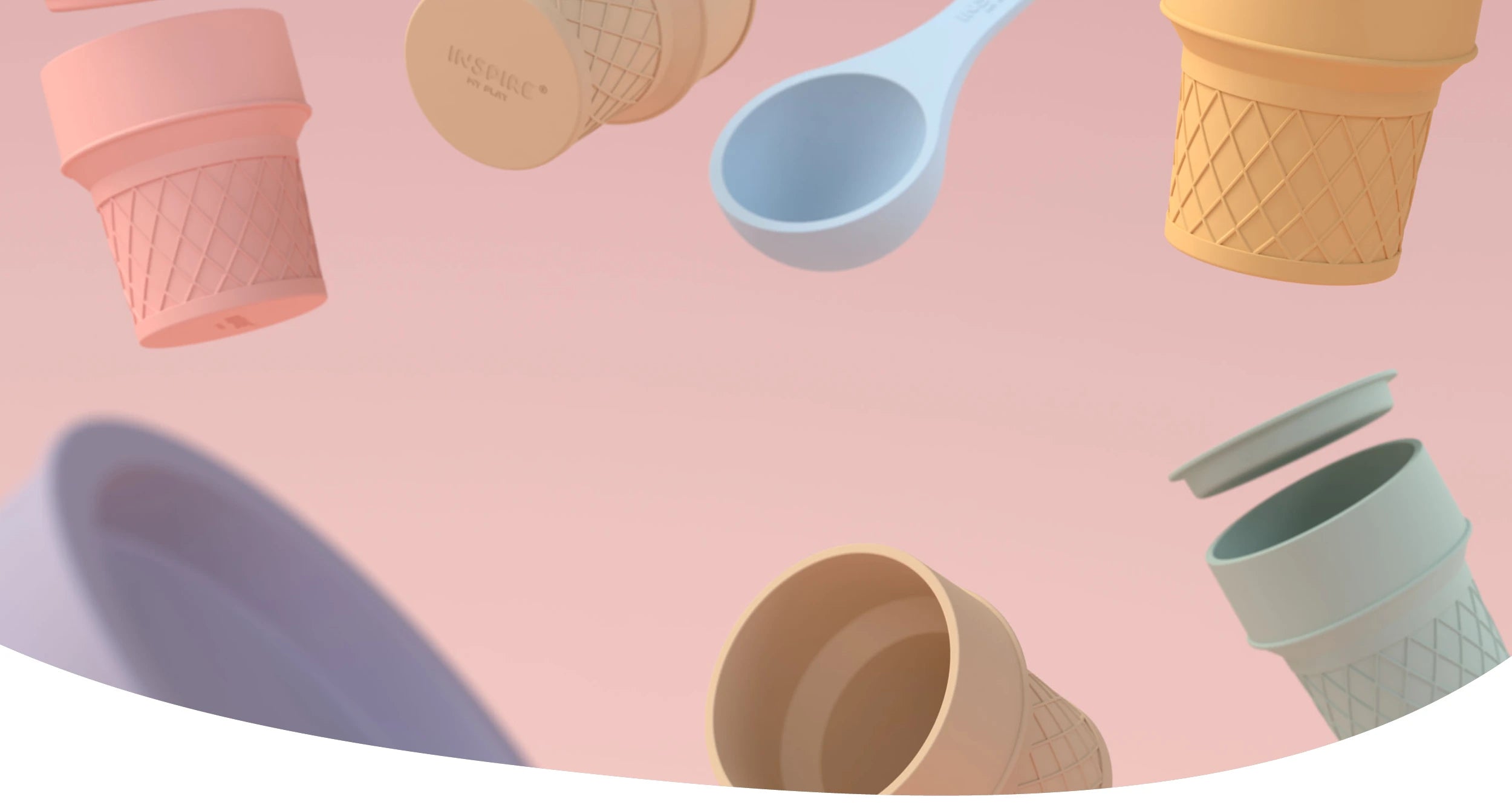 A pastel-coloured assortment of ice cream cone cups, and lids floating against a soft pink background.