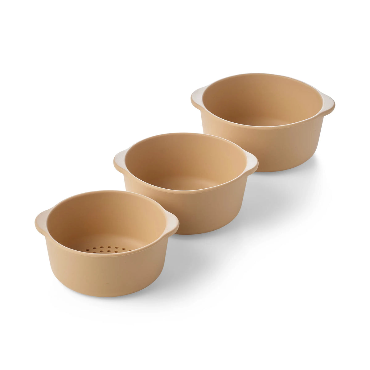 Three round beige silicone sensory play nesting bowls for children including one sieve bowl arranged diagonally on a white background.