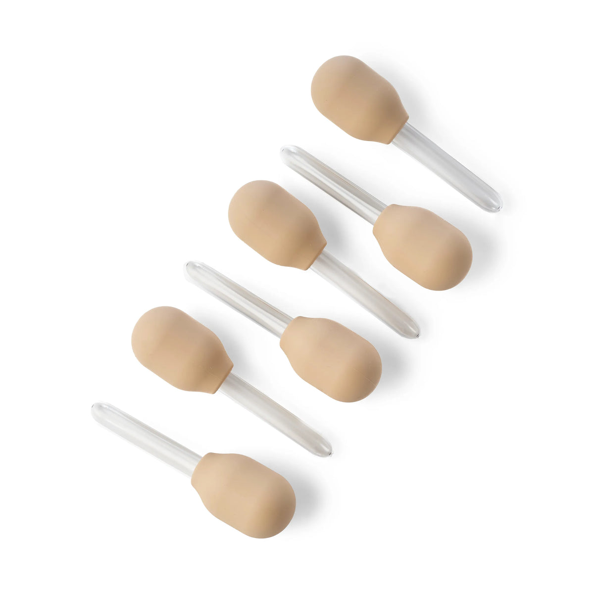 Five beige silicone droppers/pipettes for children's sensory play, water play and STEM play, each with a clear plastic tube handle, arranged diagonally on a white background.