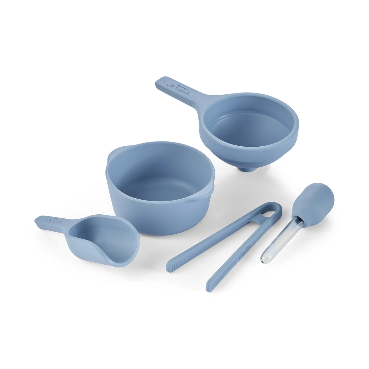 A set of silicone sensory play tools in a blue colour, including a bowl, scoop, funnel, tongs and dropper, arranged on a clean white background.
