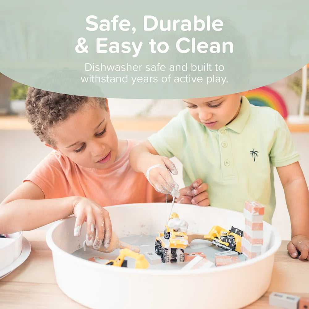 Two boys playing with diggers, mini bricks and mini blocks in the Inspire My Play PlayTRAY with text about how the PlayTRAY is built for active play and messy play activities.