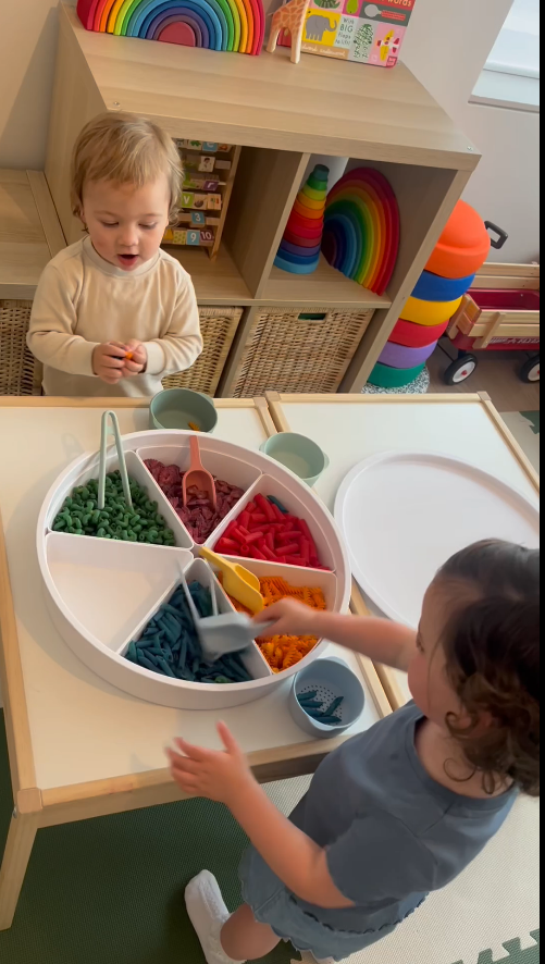 Two children playing with Sensory Play Explorer Set in a playroom
